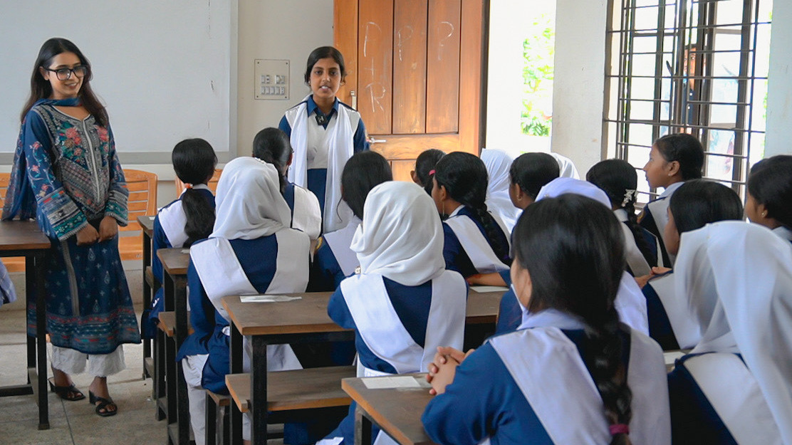 Students participating in an AI club activity